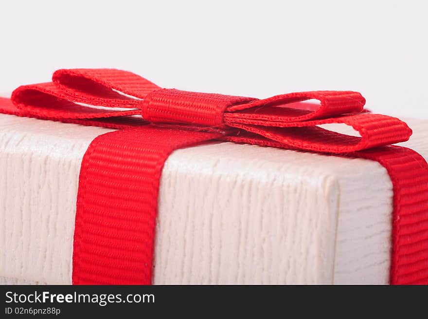 Gift box with red ribbon