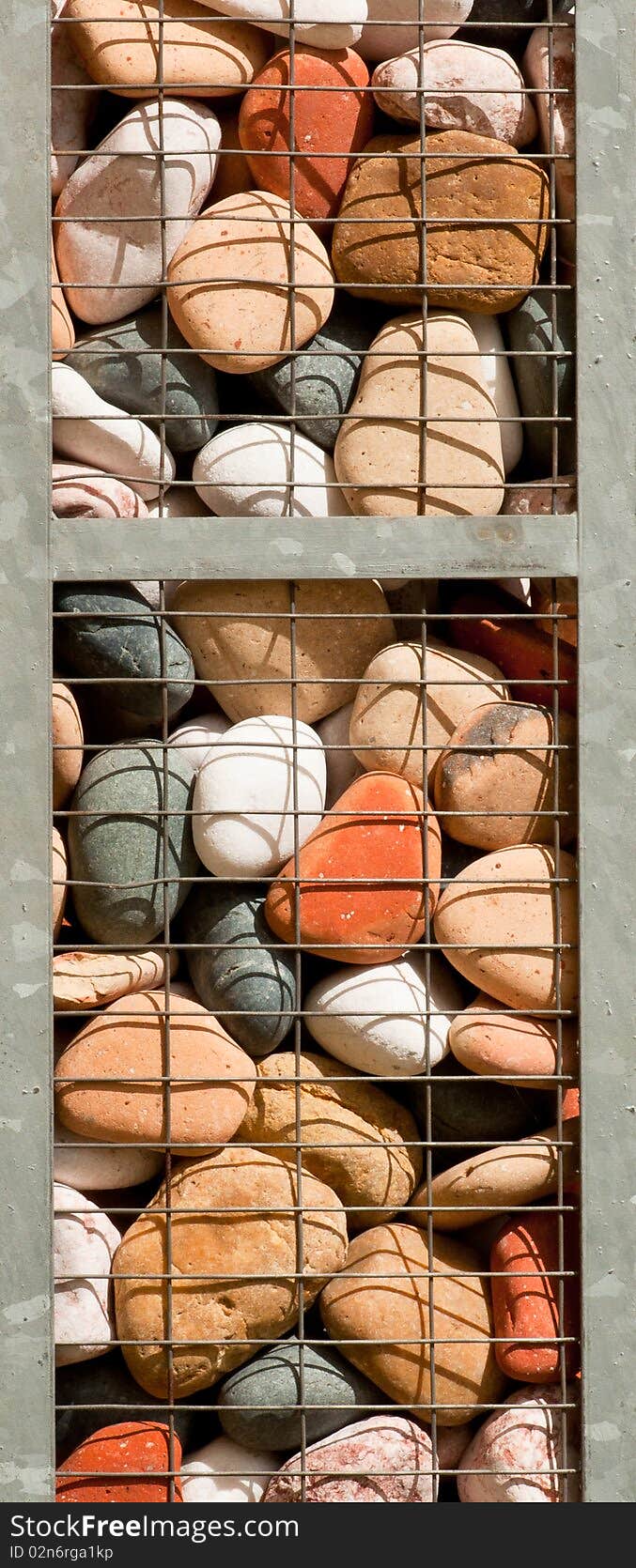 A Vertical Caged Colorful Stones Decoration