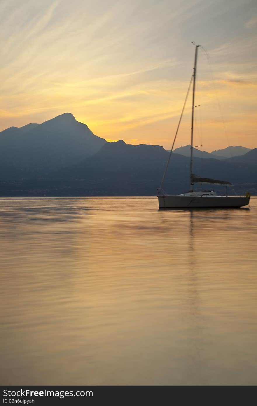 A boat at sunset on Lake Garda. A boat at sunset on Lake Garda