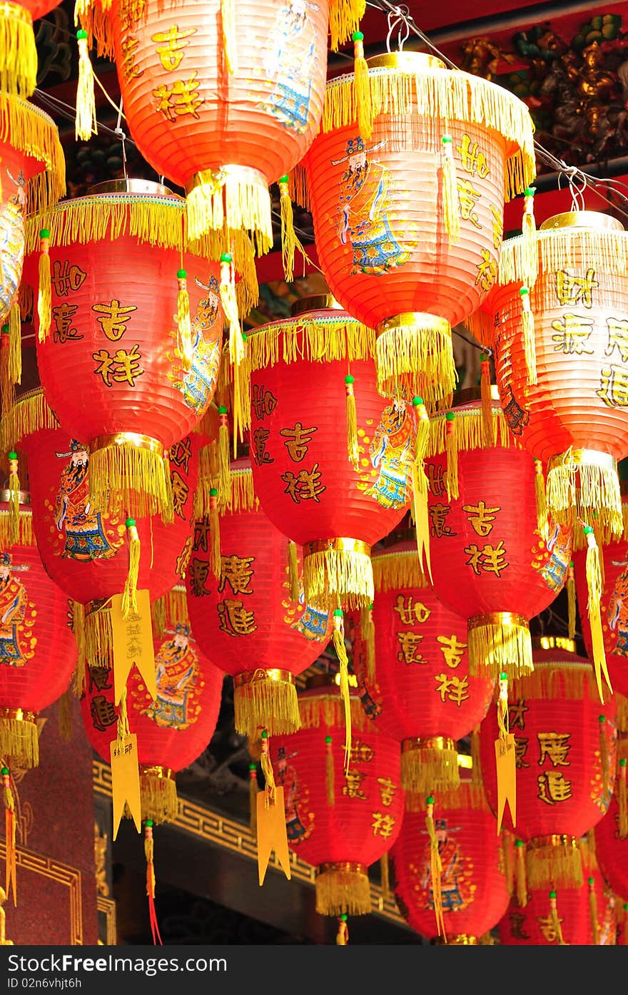 Many chinese lanterns on the temple