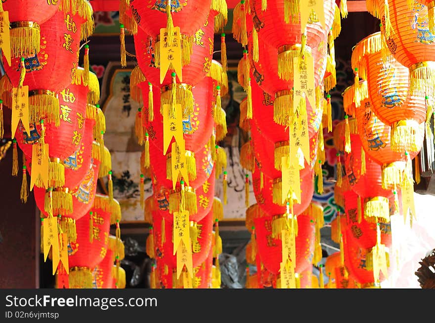 Many chinese lanterns on the temple