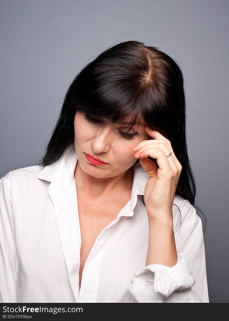 Woman's portrait with grey background