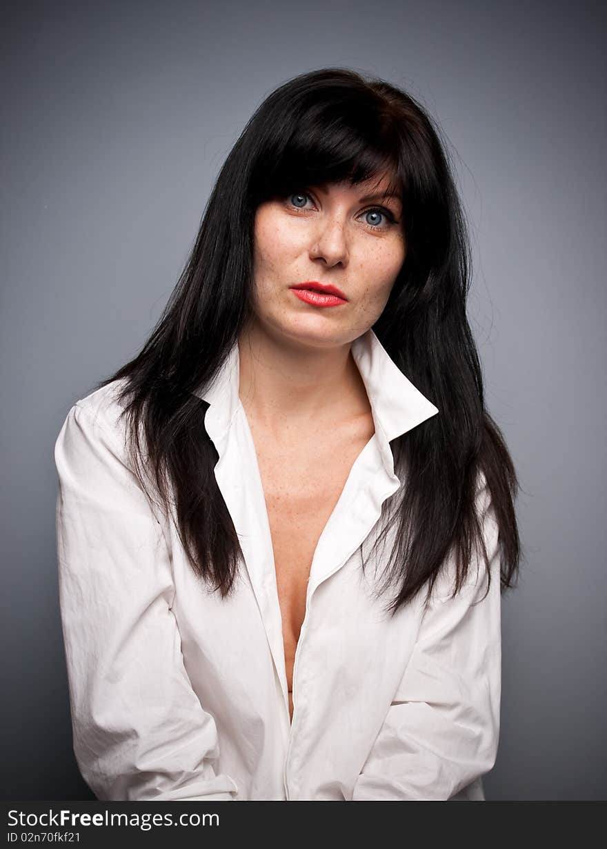 Woman's portrait with grey background