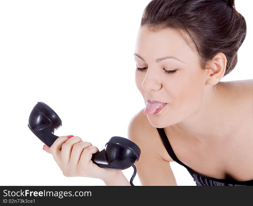 Brunette showing tongue to phone