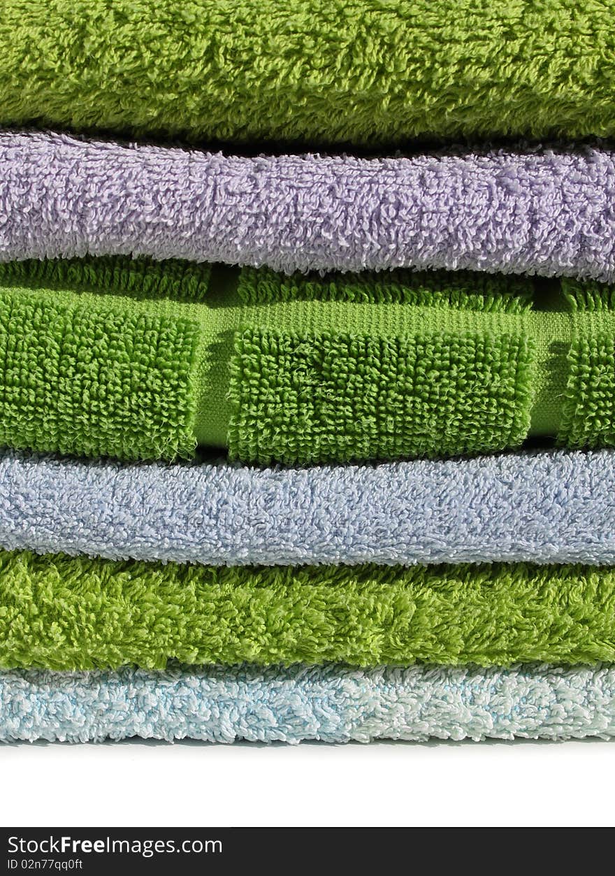 Colorful pile of soft clean terry cloth towels sharp details. Colorful pile of soft clean terry cloth towels sharp details