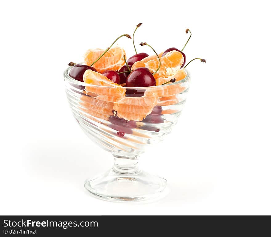 Fresh fruits and cherries isolated on a white background