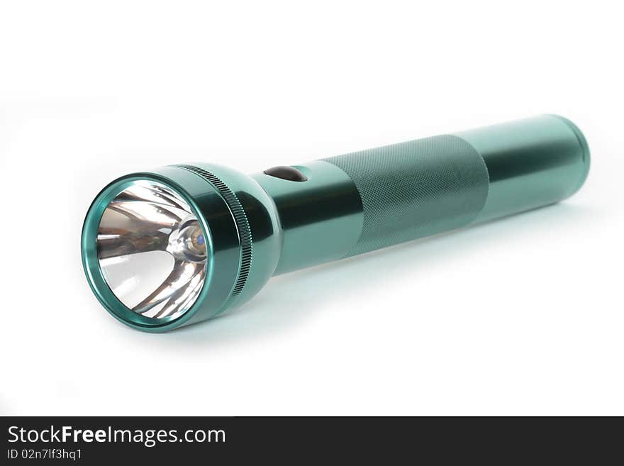 Green anodized aluminum flashlight on white background. Green anodized aluminum flashlight on white background