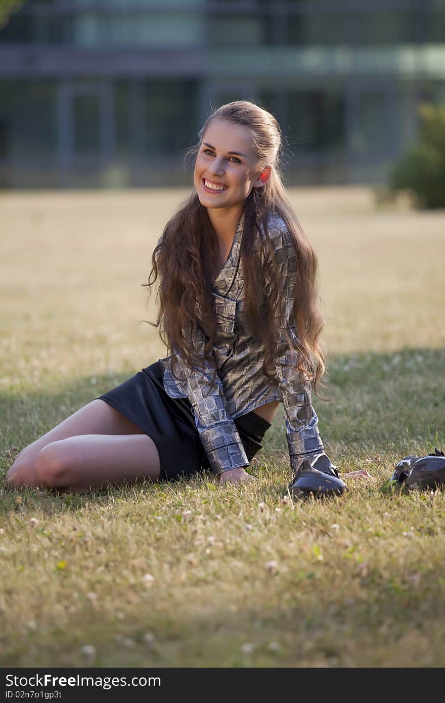 Woman relaxing on grass