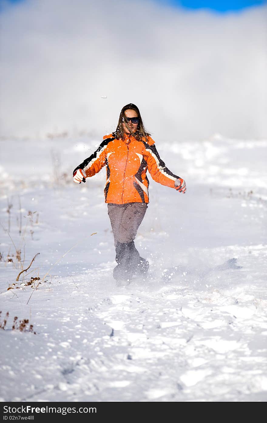 Woman running on the snow