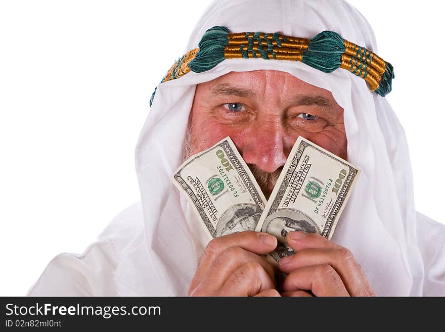 Older Arab man smiling through hundred US dollar bills. Older Arab man smiling through hundred US dollar bills.