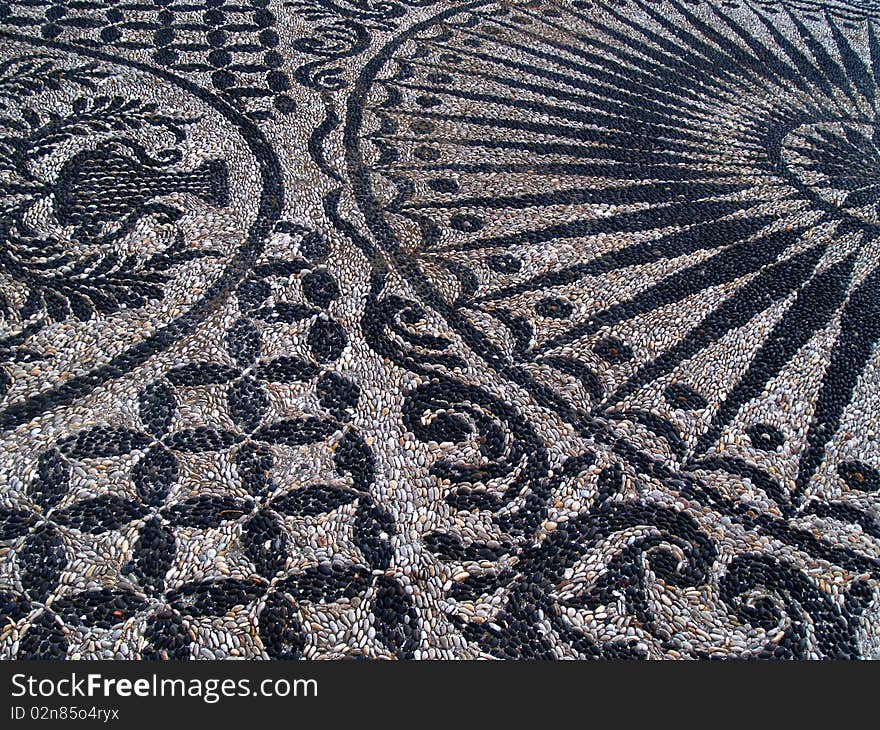 Stone pattern with black and white stones in Xios (greece). Stone pattern with black and white stones in Xios (greece)