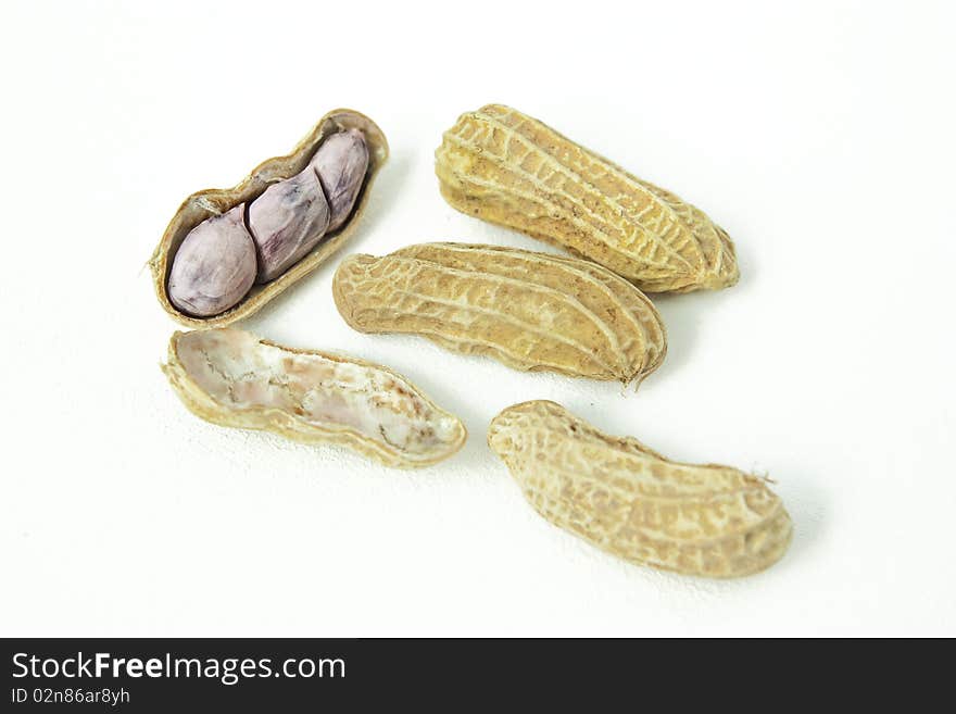 Boiled peanuts on white background