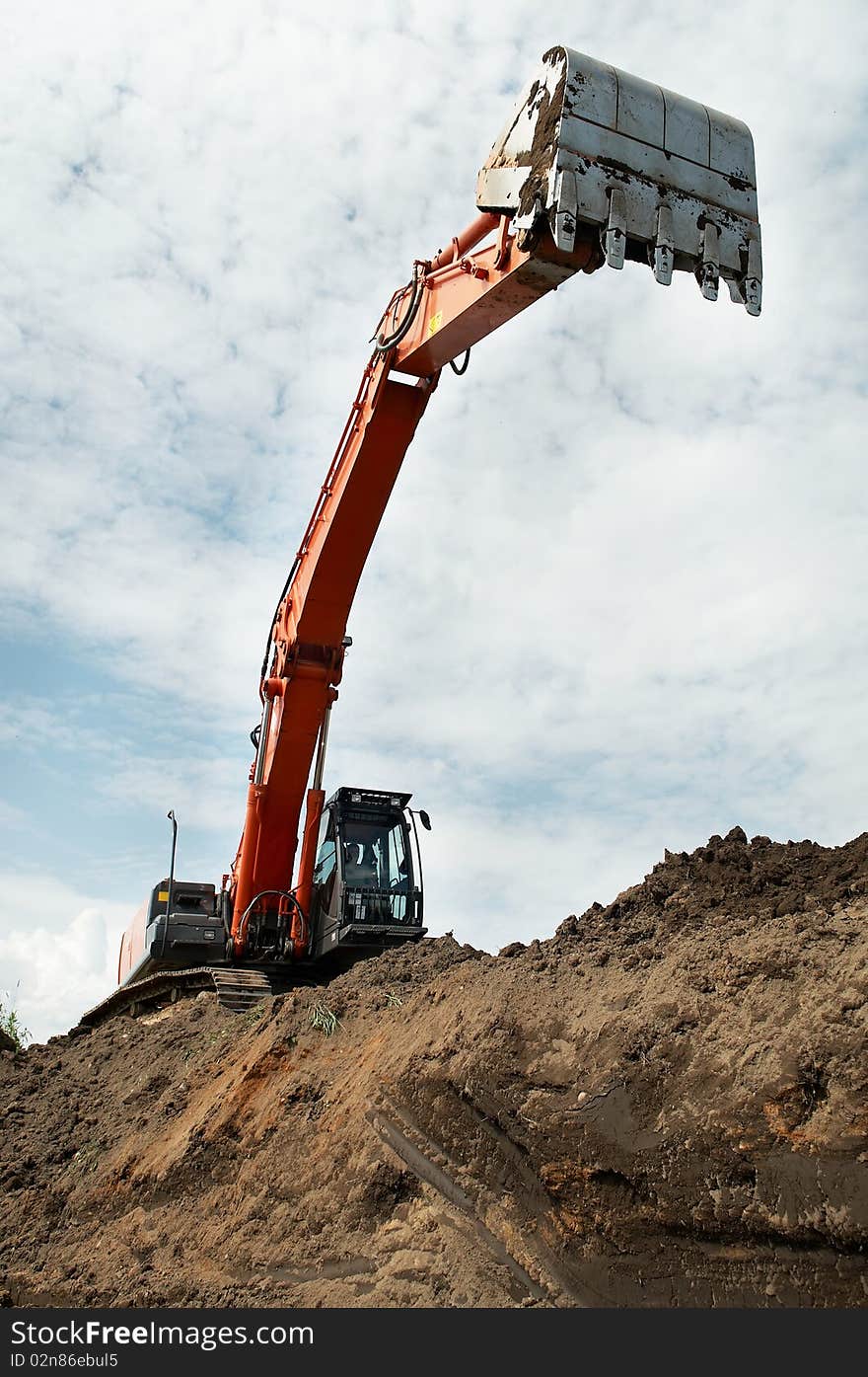 Loader excavator at construction