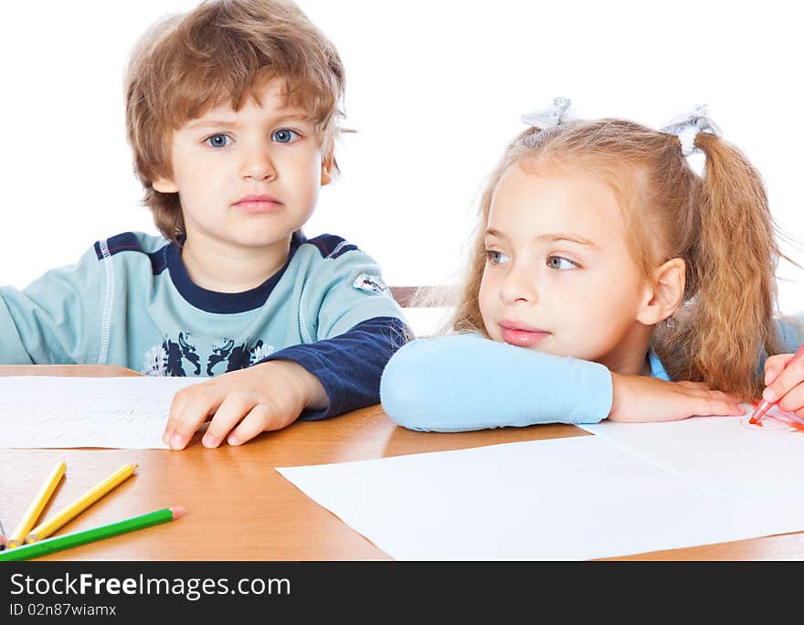 Girl and boy are painting. Isolated on white background