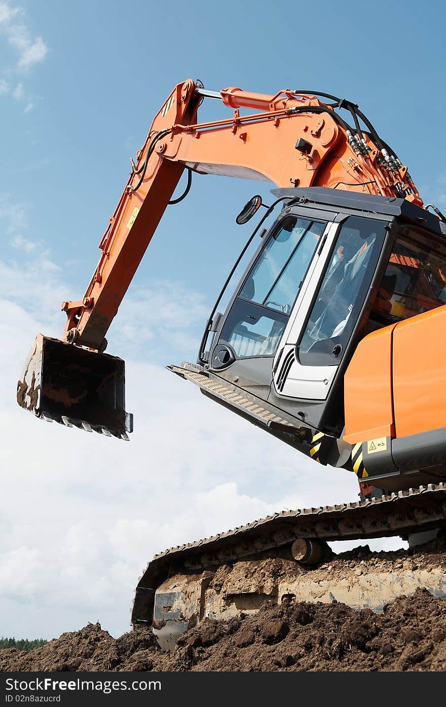 Loader excavator at construction