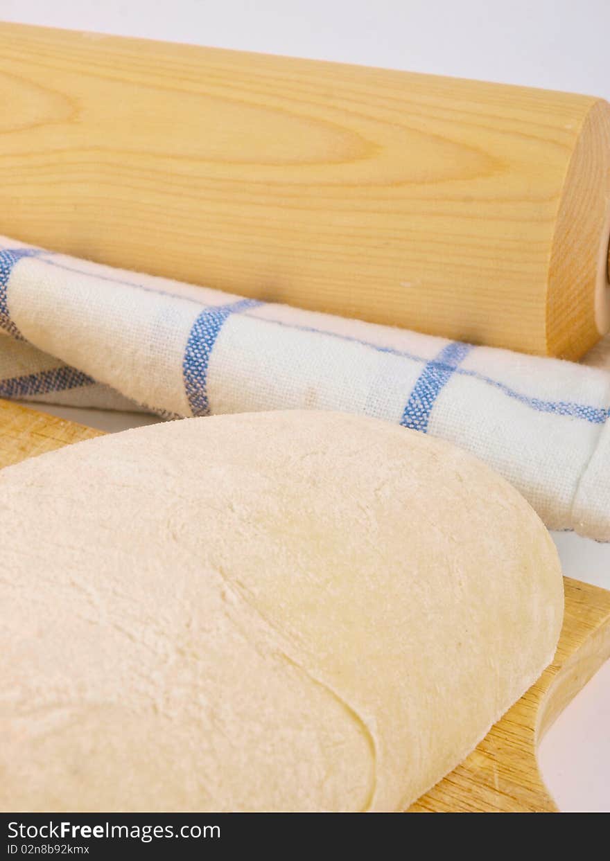 Wheat bread dough. Close up on white background