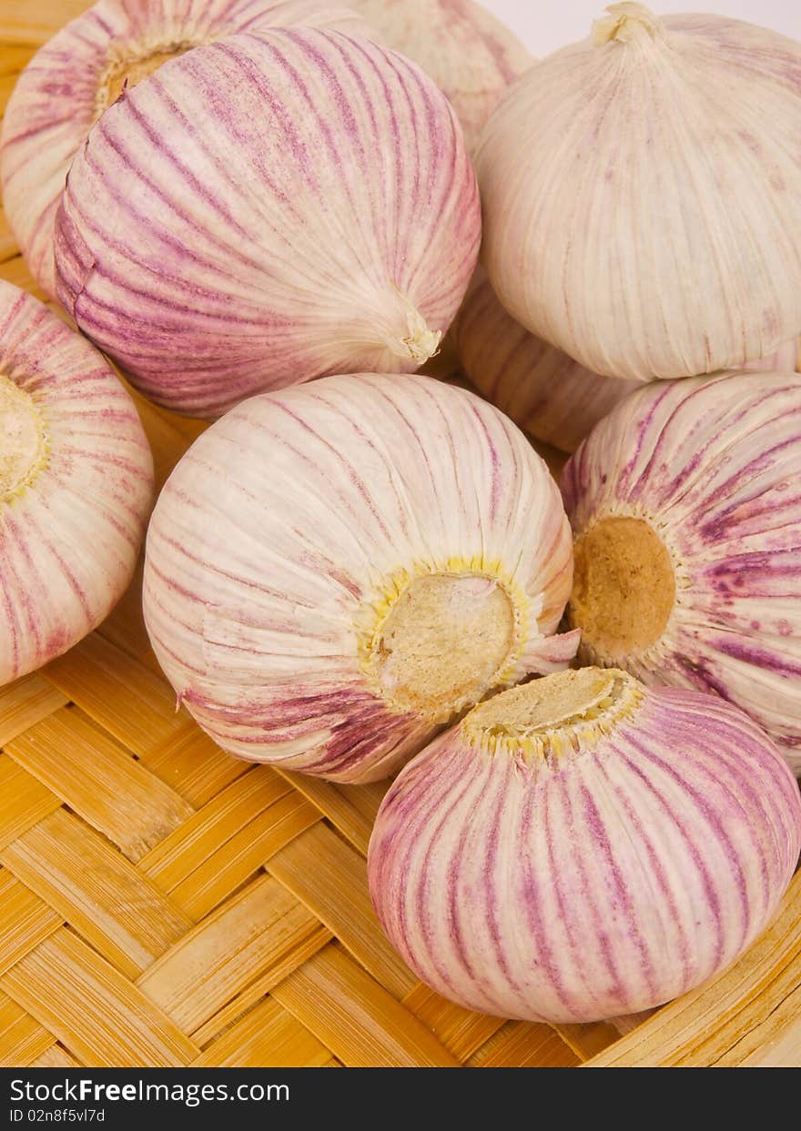 Garlic. Close up in a wodden basket