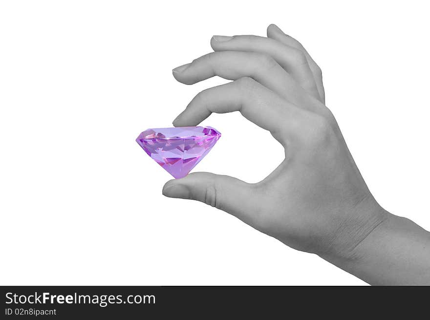 Isolated gray hand with a big purple jewel. Isolated gray hand with a big purple jewel