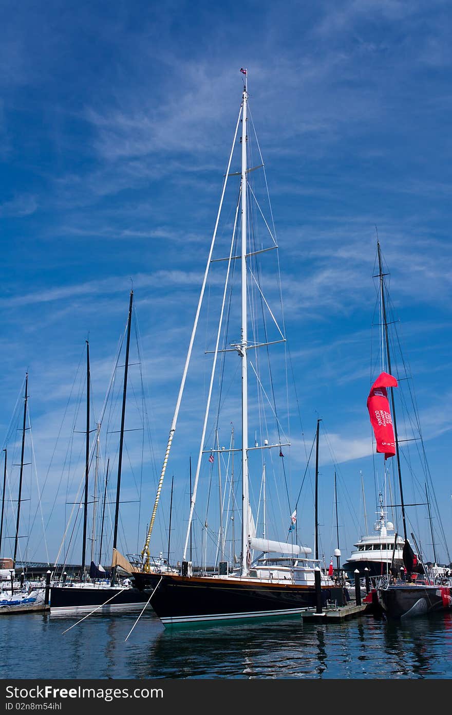 Sailboats docked in a New England Harbor. Sailboats docked in a New England Harbor