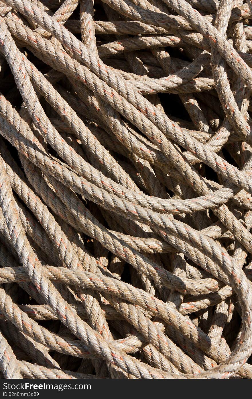 Background image of coiled, used rope