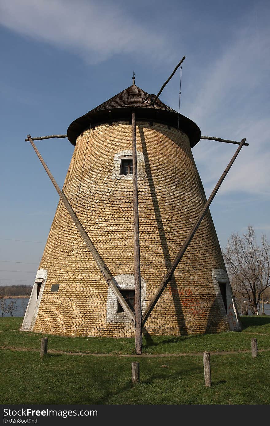 Old windmill on the lake