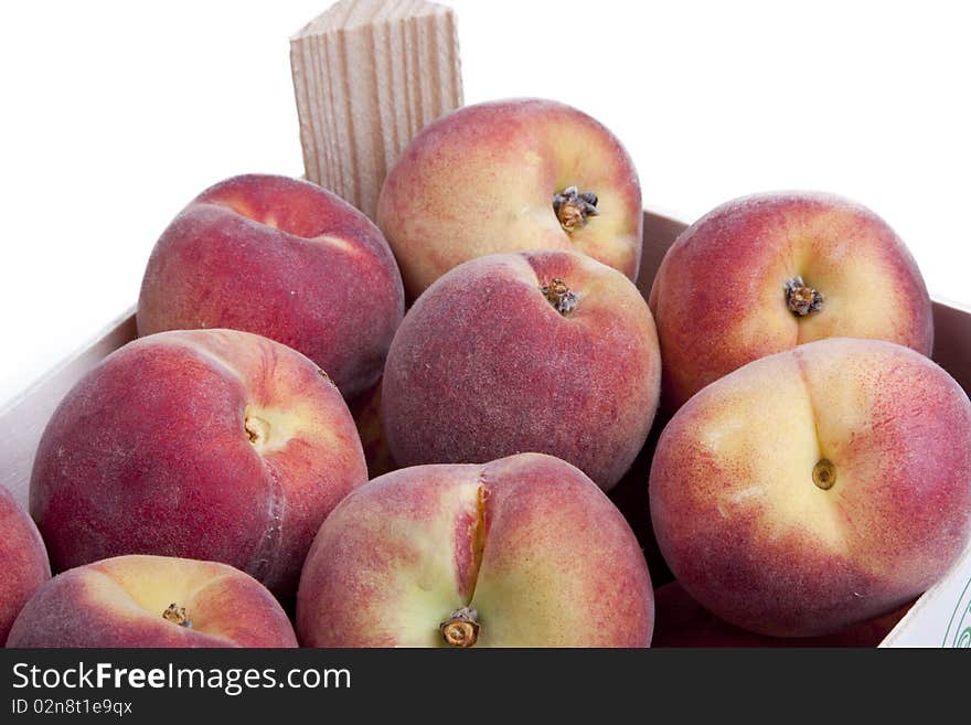 Detail of a crate of peaches