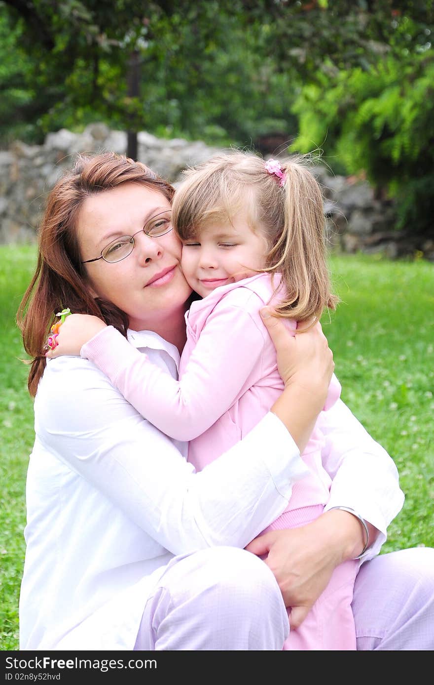 Girl With Mom Outdoors