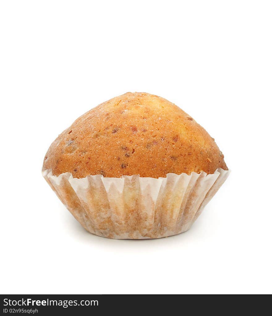 A wheat muffin isolated on a white background