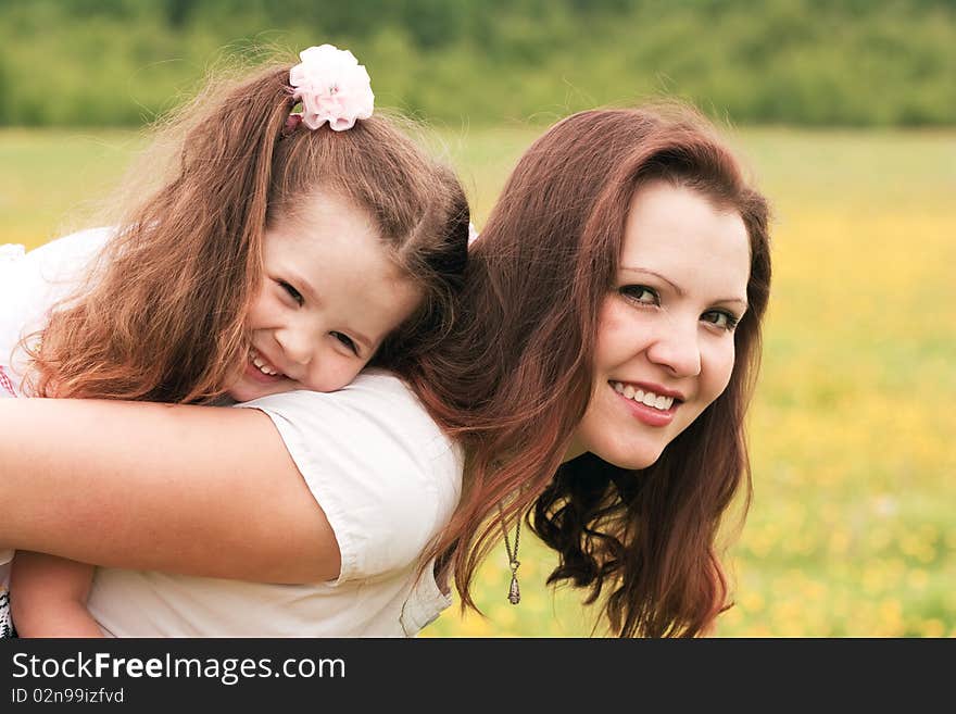 Mum with a daughter on the nature. Mum with a daughter on the nature