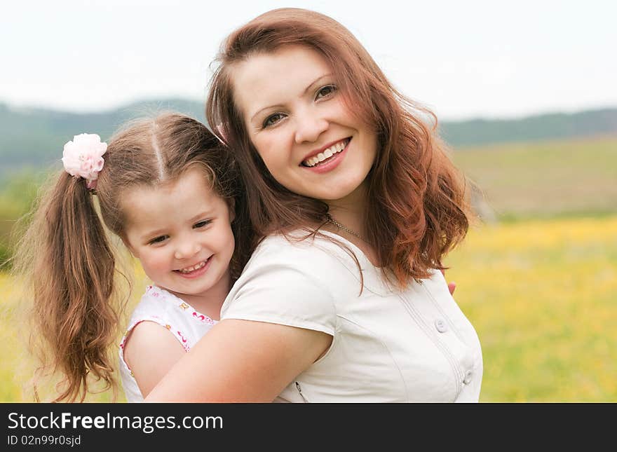 Mum with a daughter on the nature. Mum with a daughter on the nature