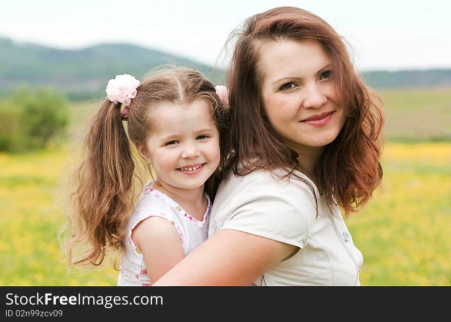 Mum with a daughter on the nature. Mum with a daughter on the nature