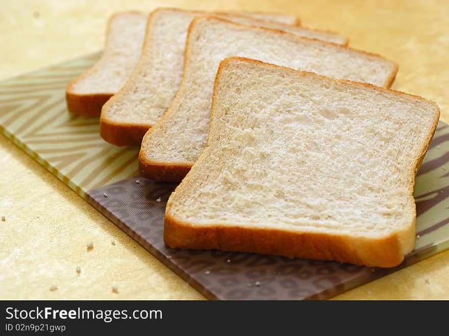 Four slices of bread on a plate