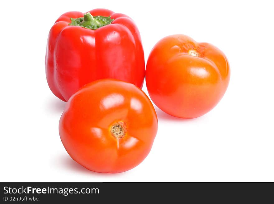 Tomato and pepper on white background (isolated, clipping path)