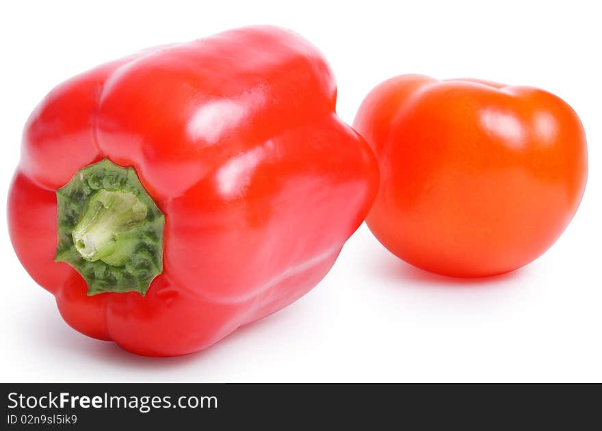 Tomato and pepper on white background (isolated, clipping path)