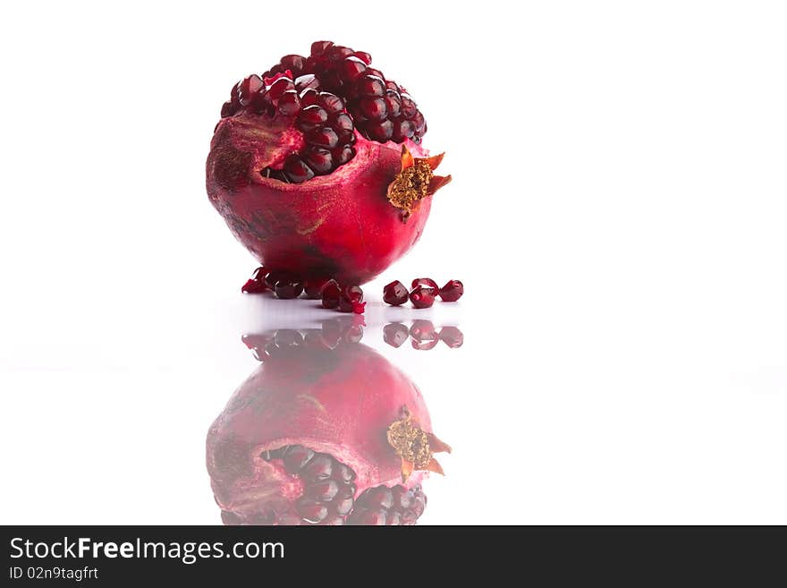 Image of a Pomegranate with a reflection. Image of a Pomegranate with a reflection