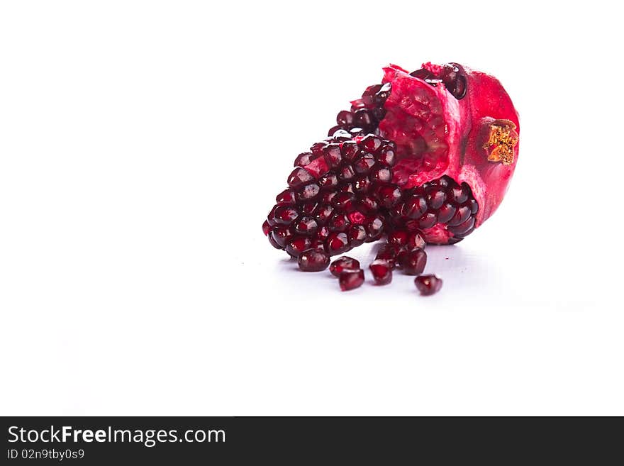 Image of a Pomegranate broken and isolated. Image of a Pomegranate broken and isolated