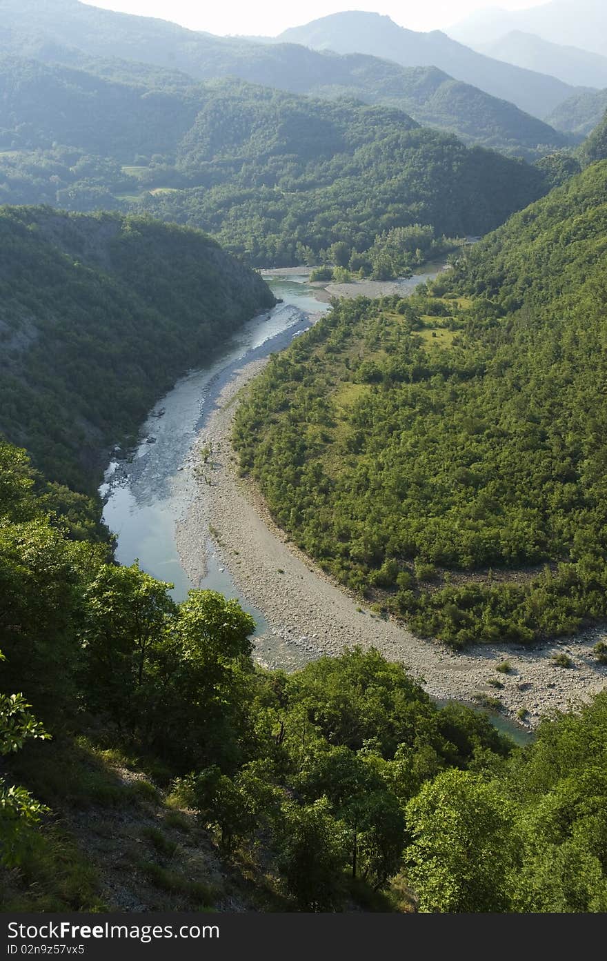 River in the upper valley, deep gorges and river bend in the mountains. River in the upper valley, deep gorges and river bend in the mountains