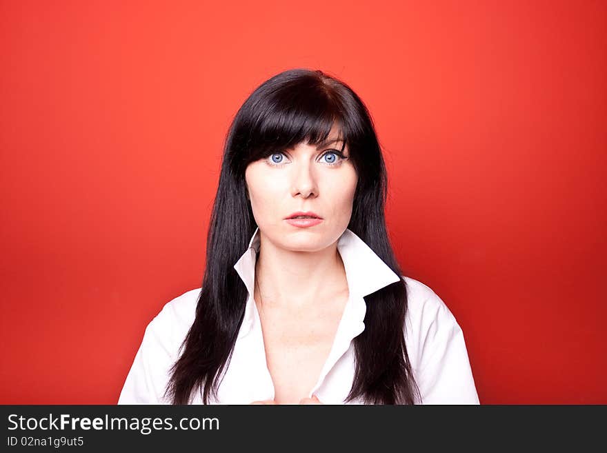 Woman's portrait on red background