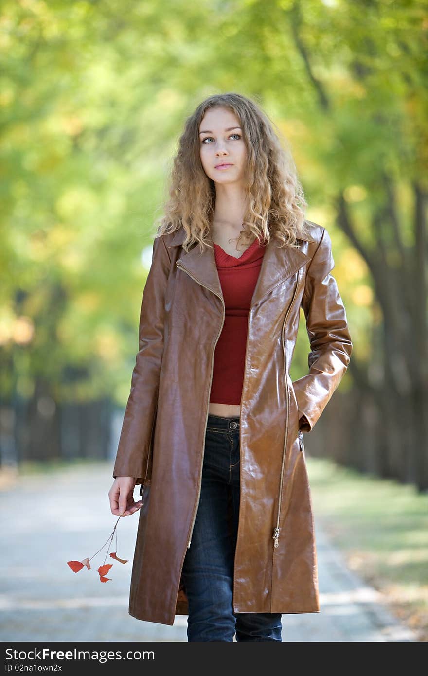 Young beauty woman in autumn outdoor