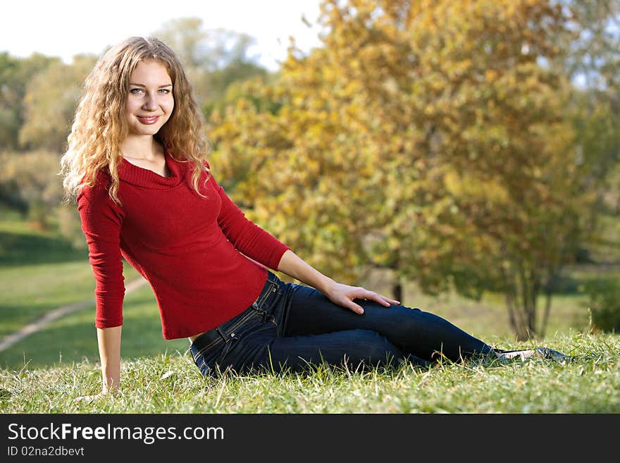 Young beauty woman in autumn outdoor