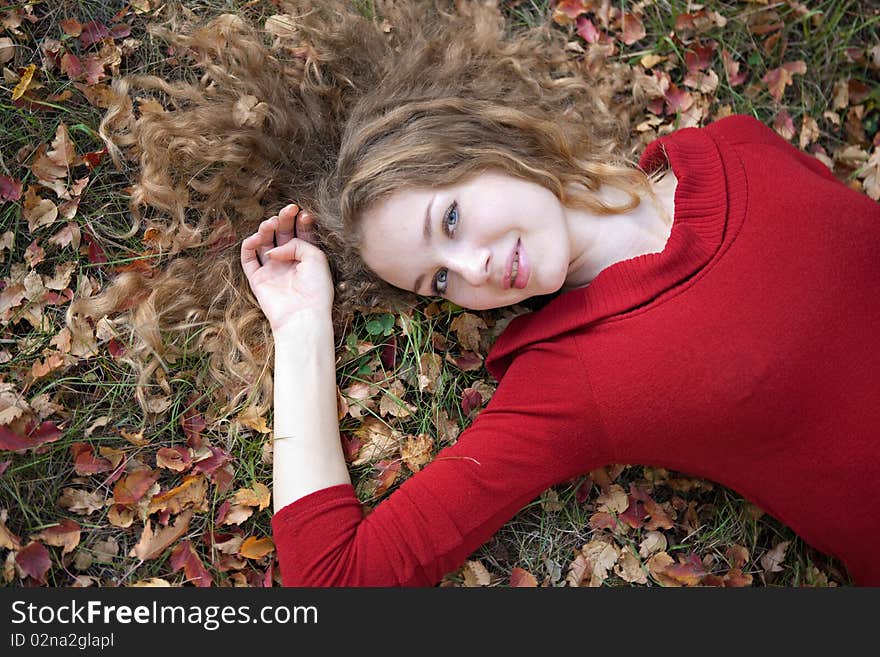 Young beauty woman in autumn outdoor