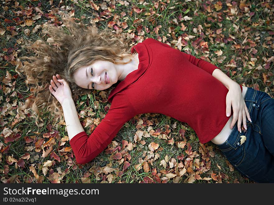 Young beauty woman in autumn outdoor