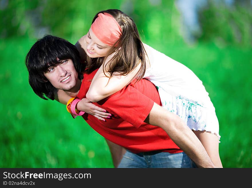 Long-haired girl with smiling boy. Long-haired girl with smiling boy