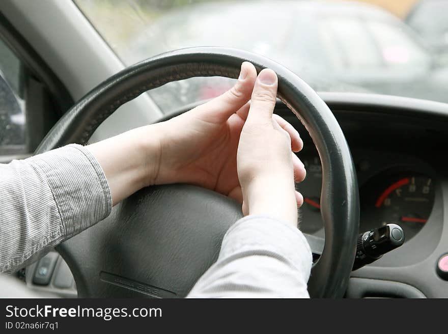 Man with his hand on the wheel. Man with his hand on the wheel