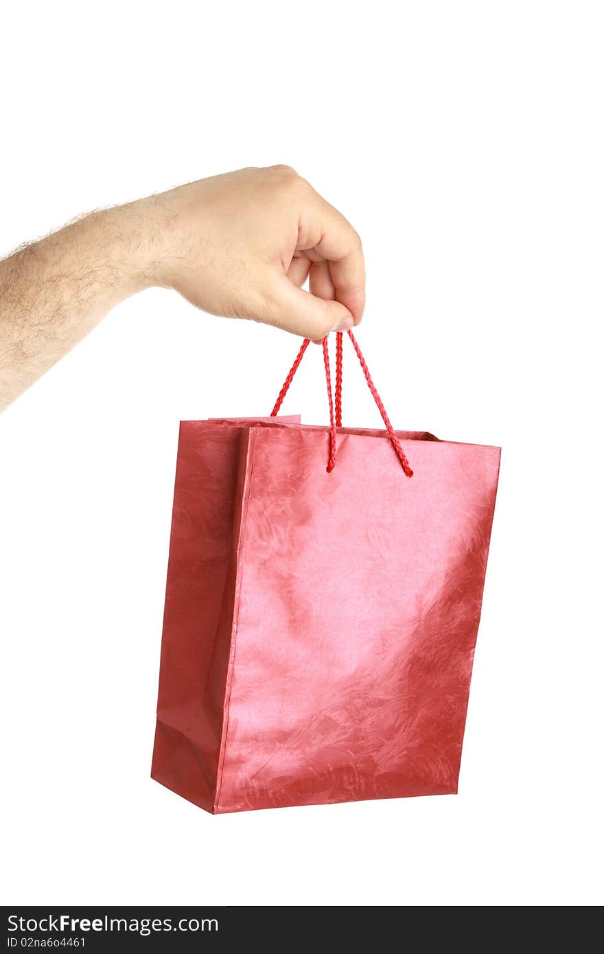 Paper bags in male hand isolated background