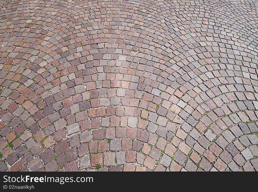 Fragment of the old street coated paving stone