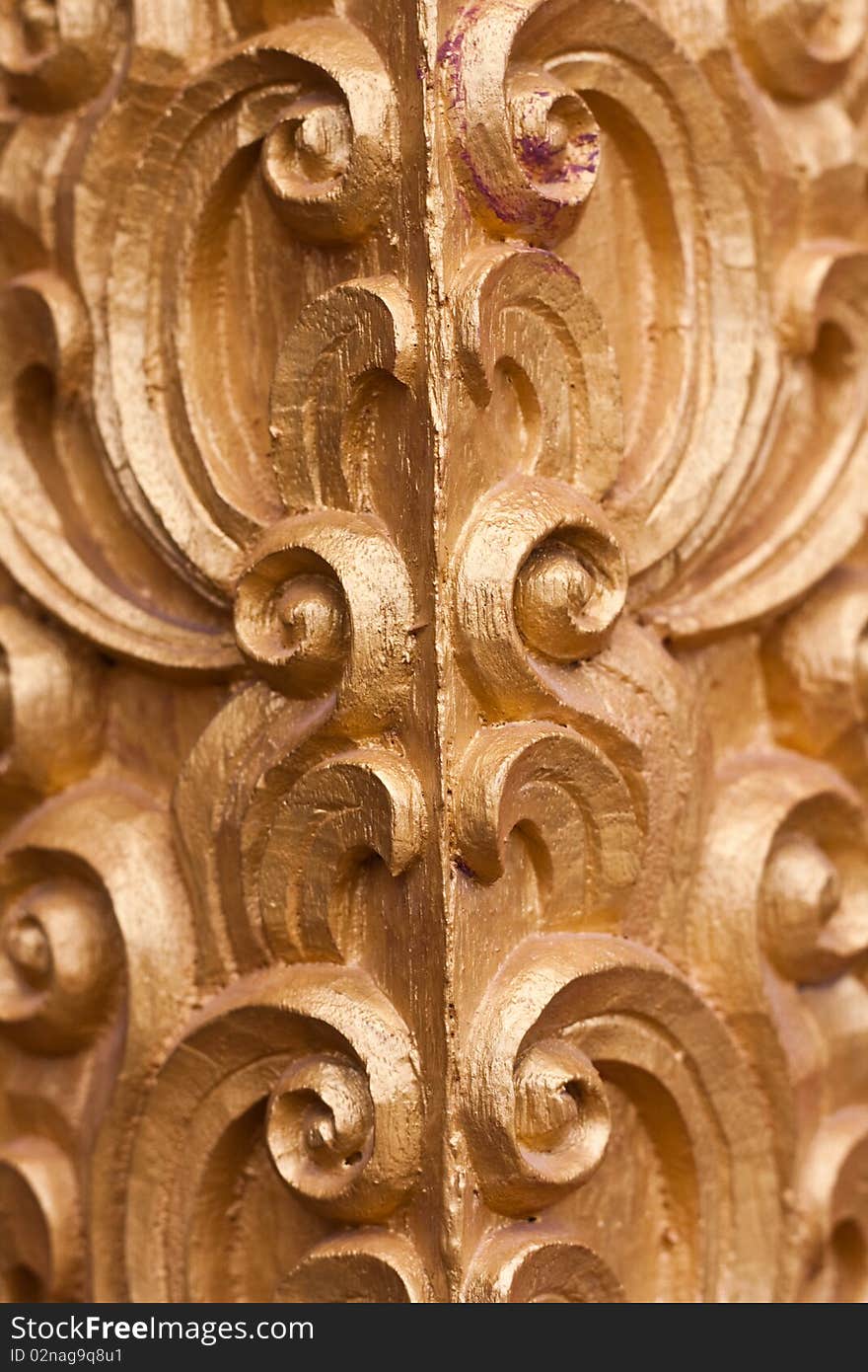 The wood carve on the door in thai temple