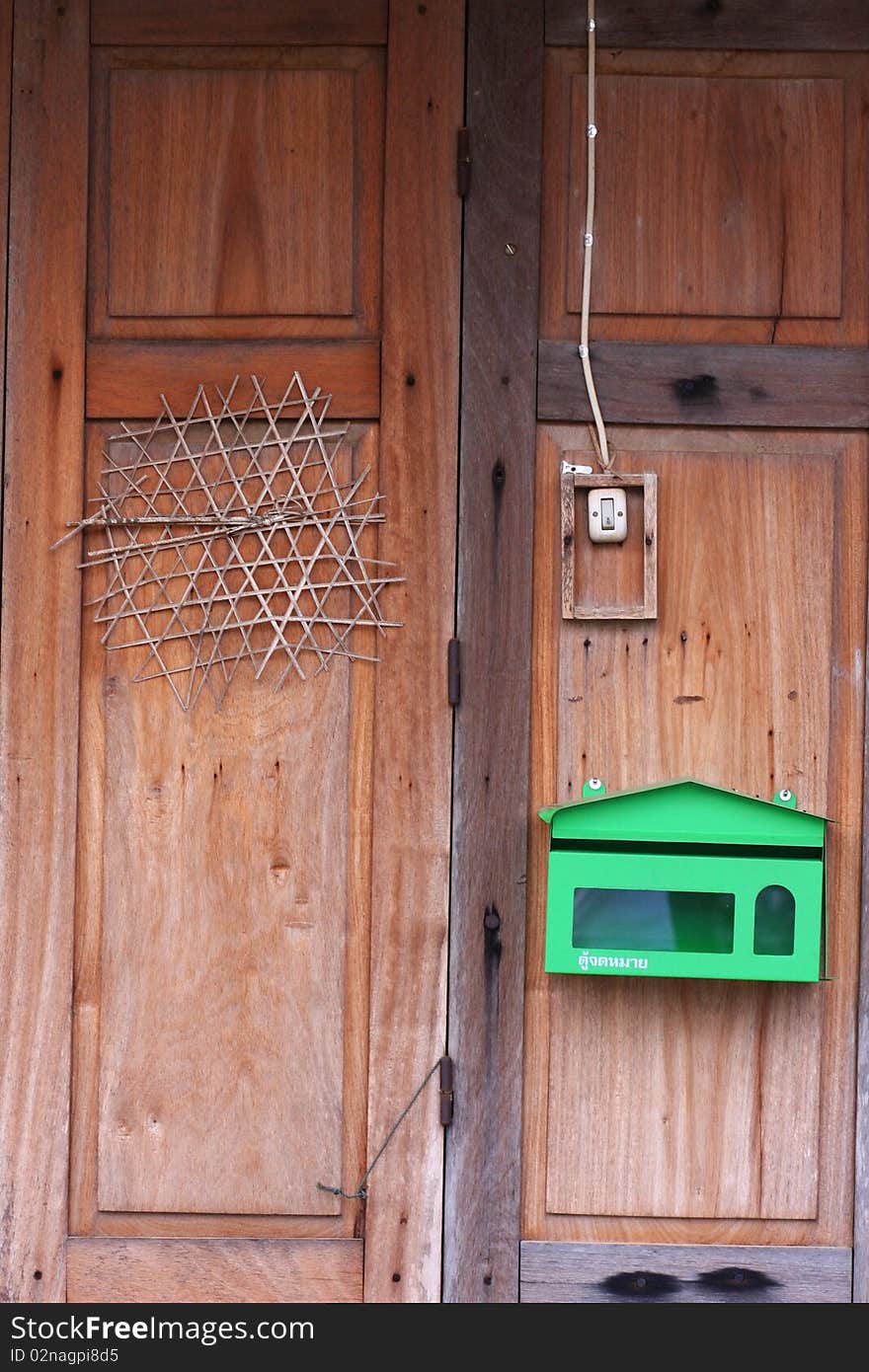 Thai mail box on the wood door