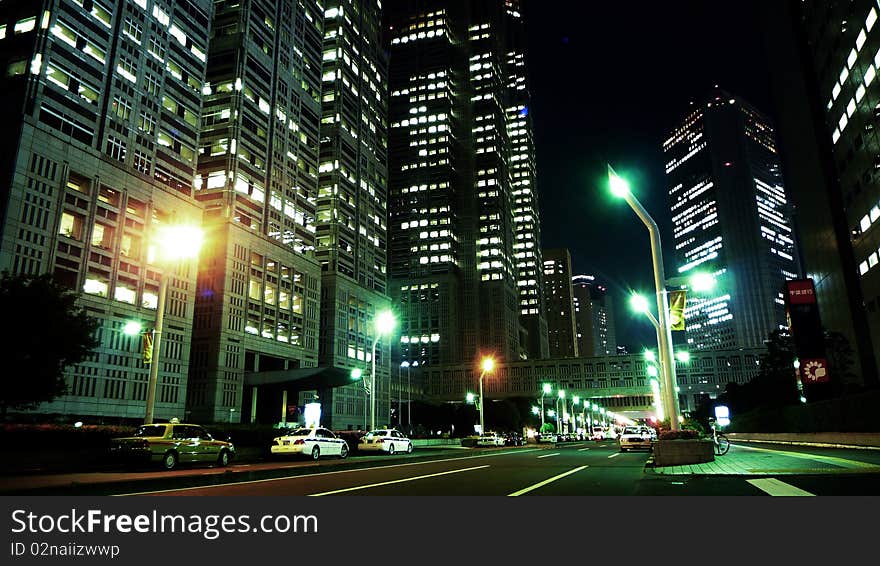 High-rises in West Shinjuku, Tokyo at night. High-rises in West Shinjuku, Tokyo at night.