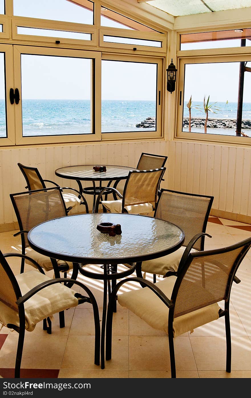 Cafe with glass tables.